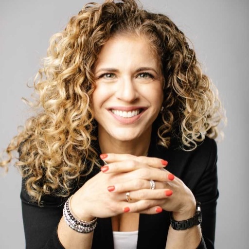 Portrait of Allie Neyjovich, Long Island real estate agent